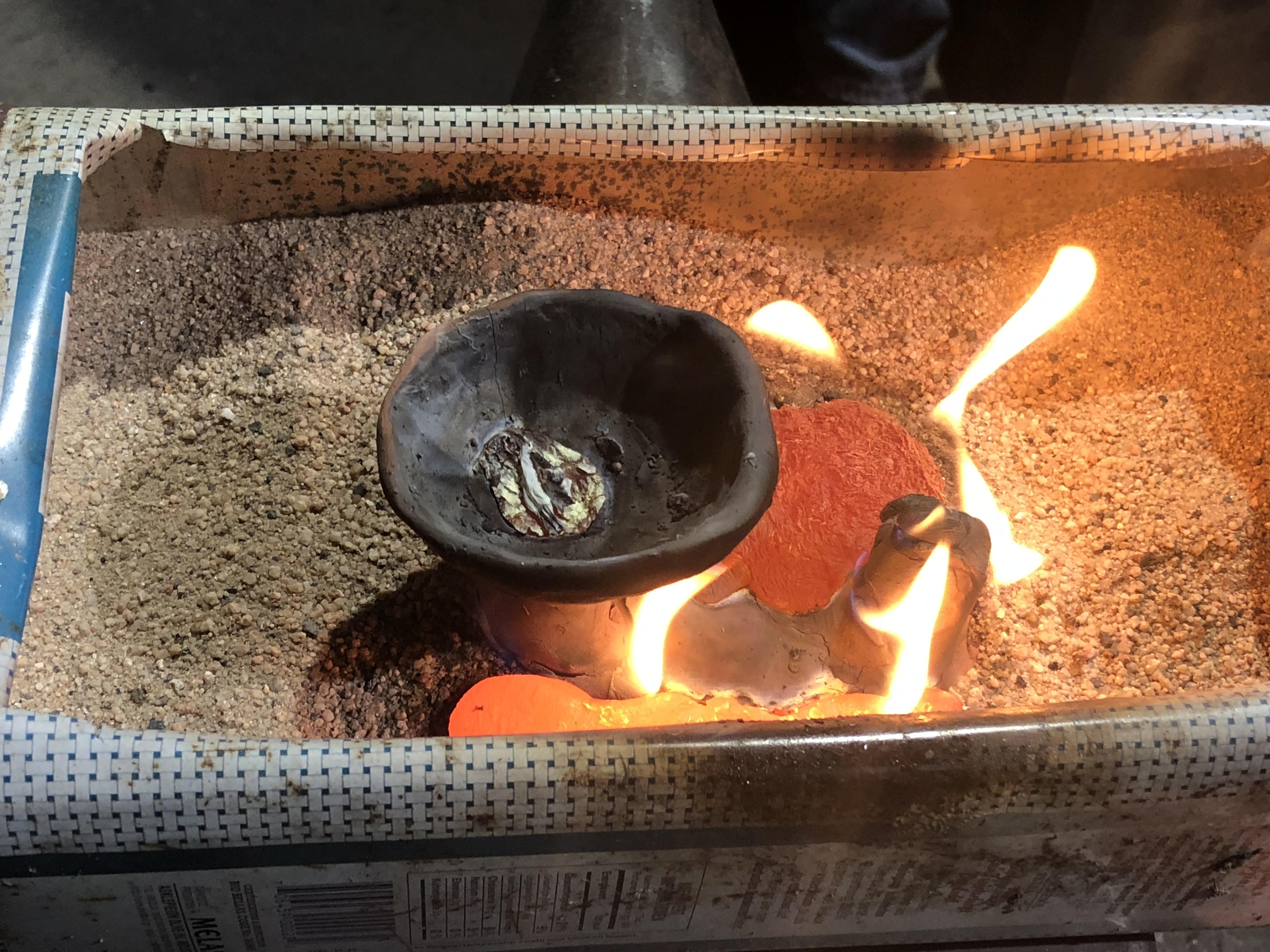 Fusion d'une Tsuba en bronze