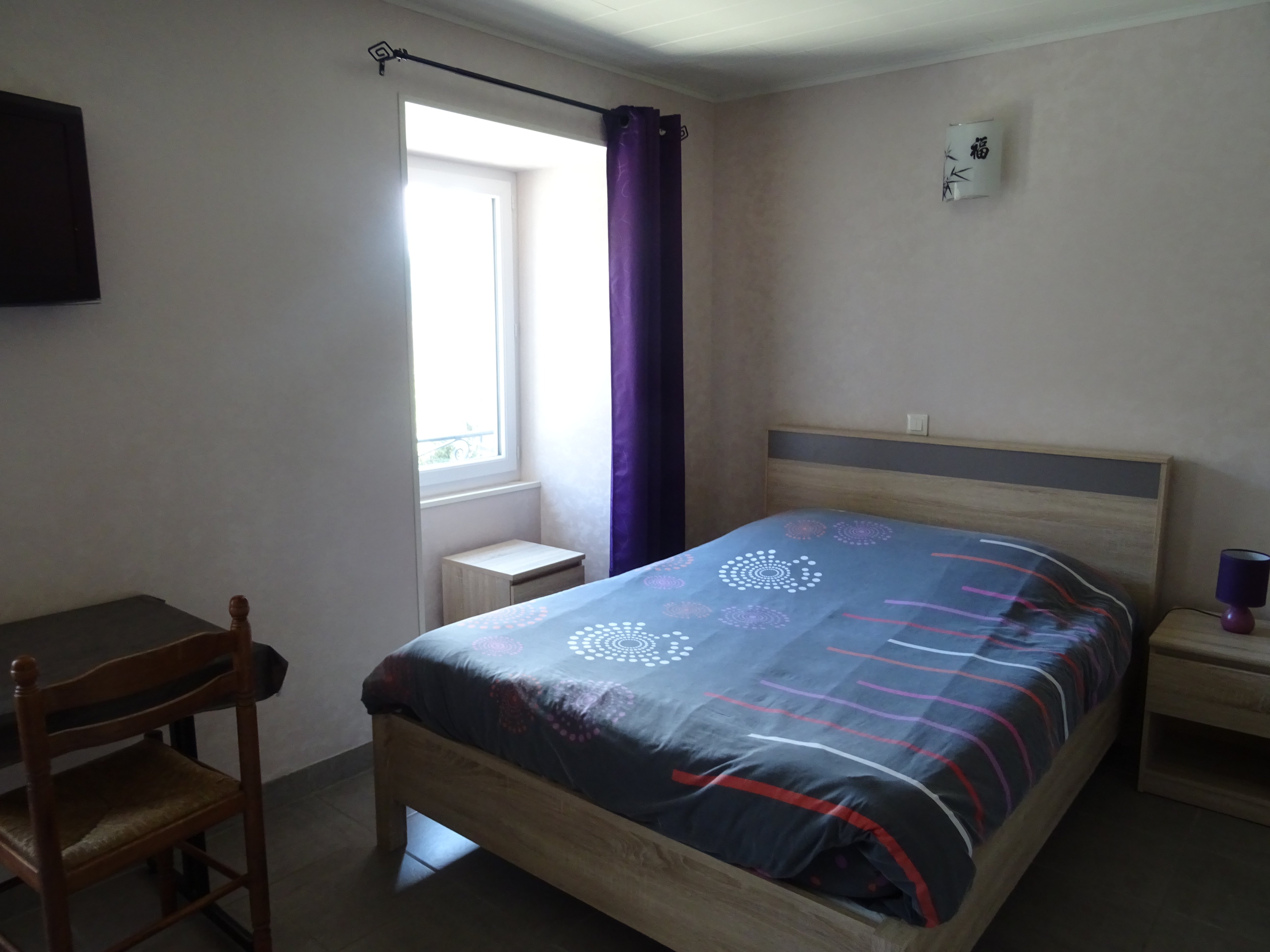 Chambre lit double, chambre d'hôtes Retour aux Sources à Meyras